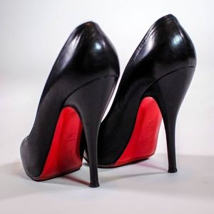 Christian Louboutin black leather pumps